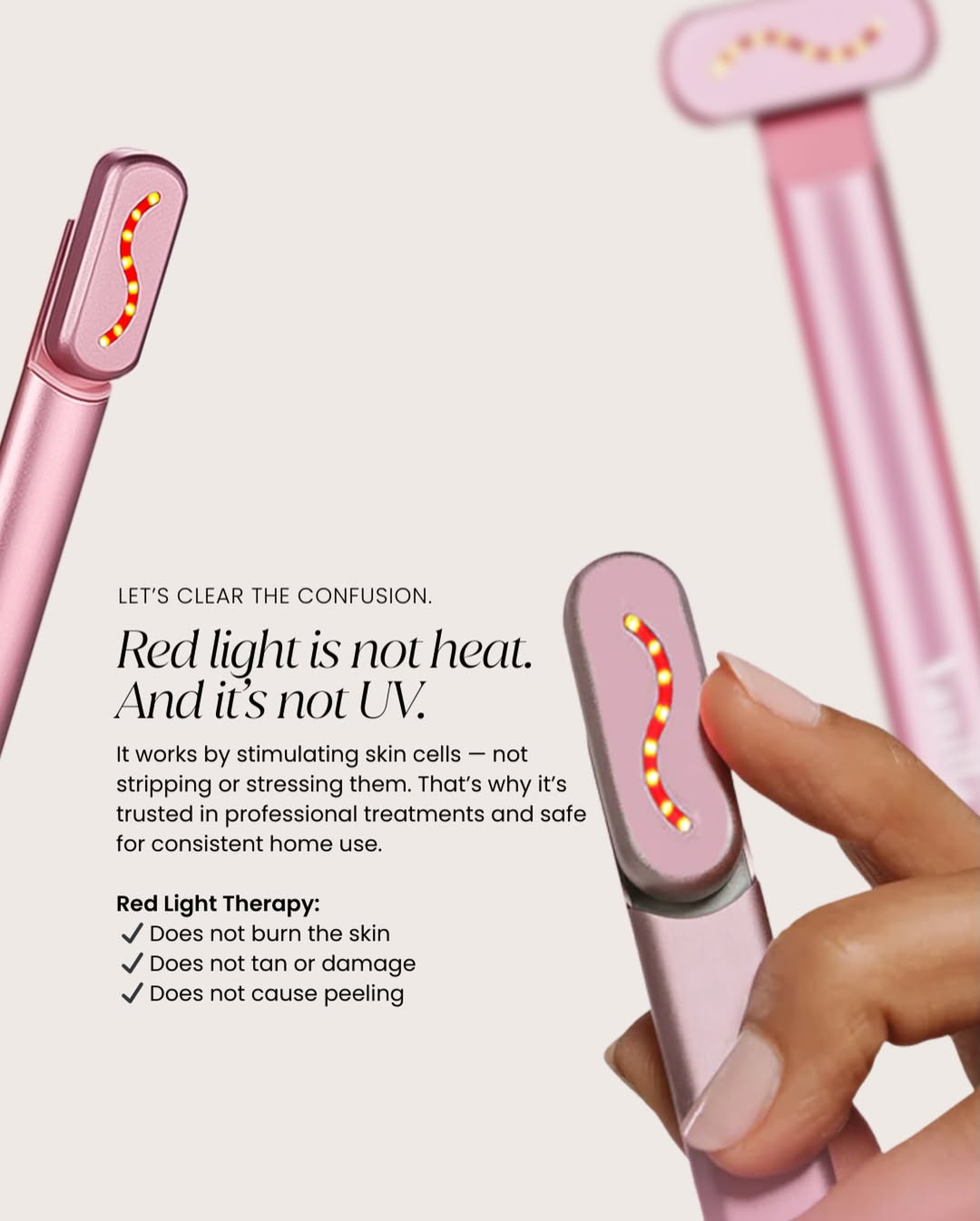 Model using the 4-in-1 skincare wand on face